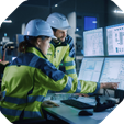 A group of people wearing hard hats and jackets looking at a computer screen

AI-generated content may be incorrect.